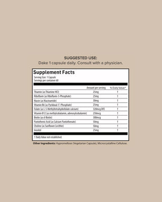 A supplement facts label centered on a beige background with the heading 'SUGGESTED USE:' above it. The label reads 'Dake 1 capsule daily.