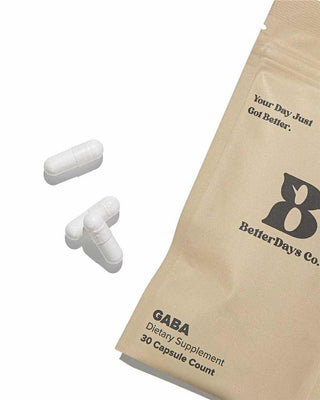 Gaba pills laying next to a bag