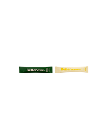 Two single-serve powder sticks labeled “Better Greens” (green) and “Better Hydration” (beige) on white background