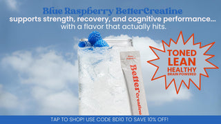 A glass with clear liquid and a BetterCreatine stick leaning on it