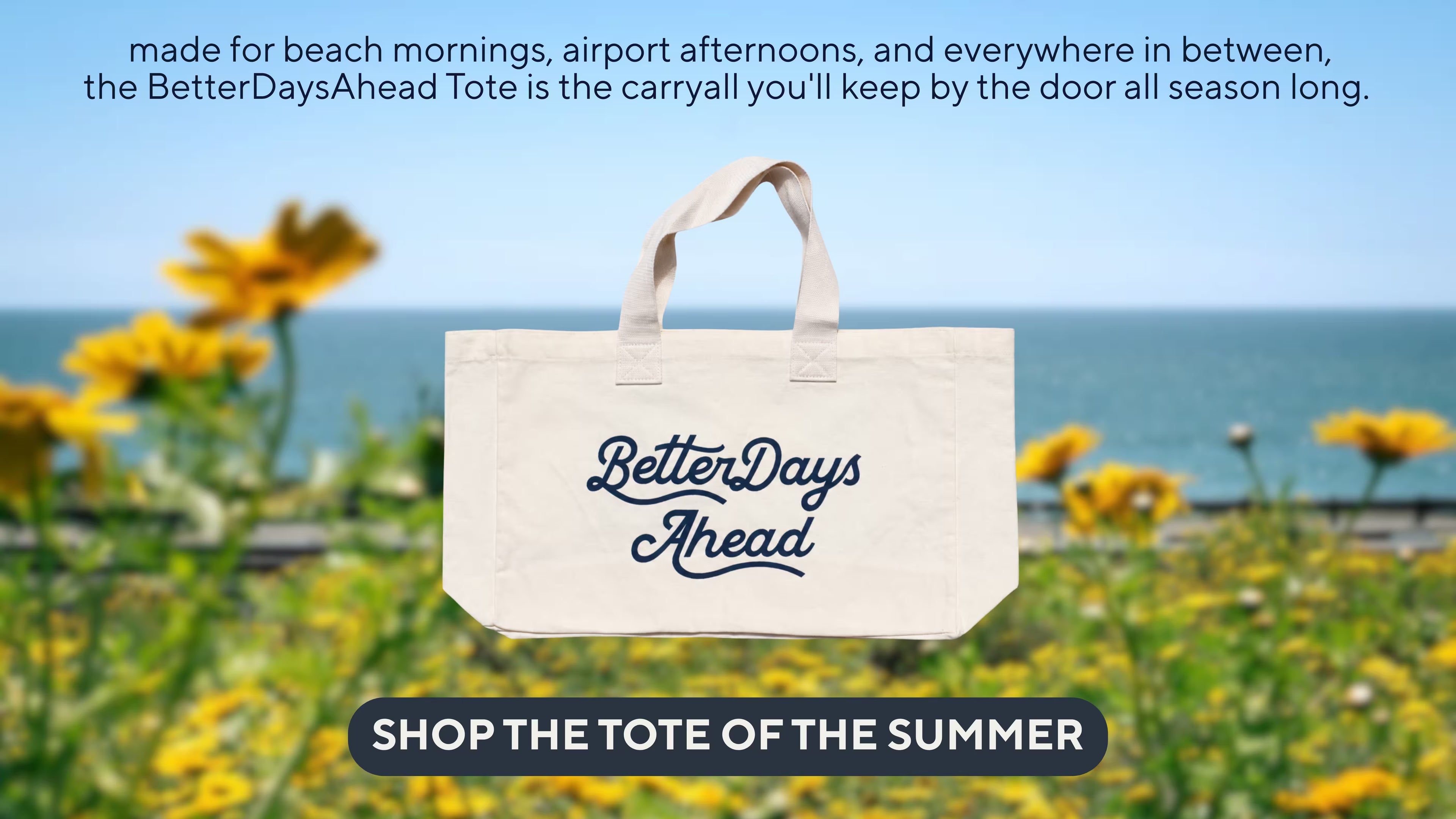 Tote bag with 'Better Days Ahead' text against a scenic background with flowers and ocean.