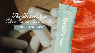 Capsules, a BetterCalm stick, and a drink with red liquid.