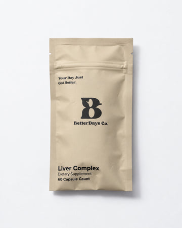 A beige stand-up pouch of BetterDays Co. Liver Complex dietary supplement, featuring a black logo and text, photographed on a clean white background.